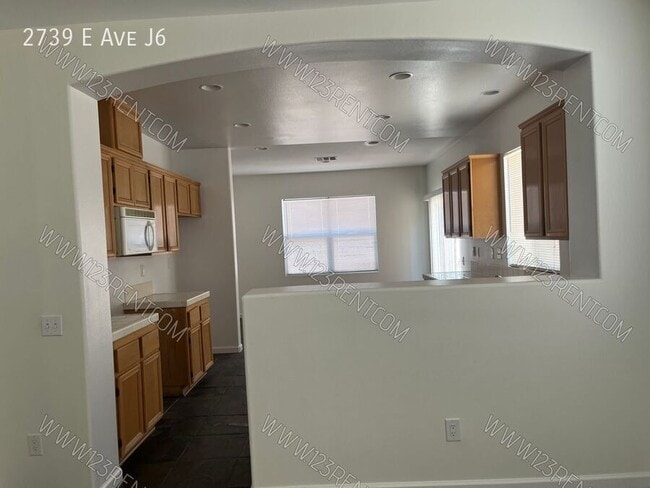 Building Photo - 2739 E Ave J6