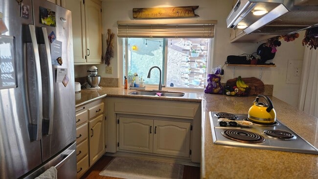 Building Photo - Spacious 4-Bedroom 2 Bath Home with a Large, Serene Backyard and Courtyard.