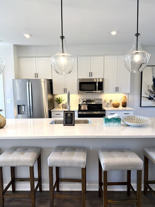 Building Photo - Be the First to Live Here! Brand-New 3BR Condo in Coalfield Station – Modern Living in the Heart ...