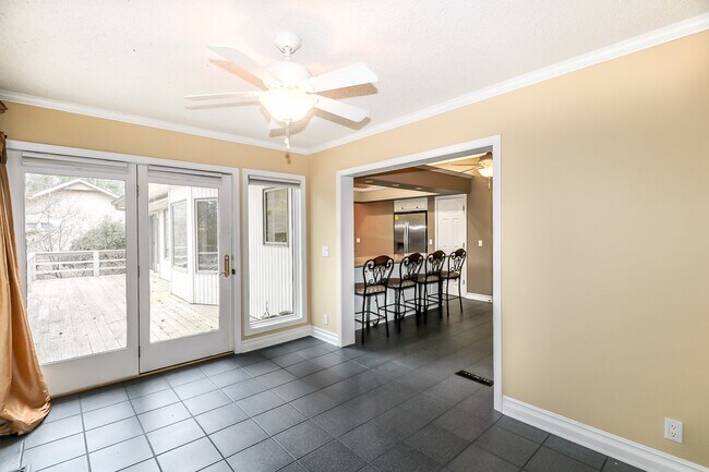 Building Photo - Beautiful 4 Bedroom, 3 Bath home. It has a 2 car garage plus a 1 car carport.  Stay warm in the w...