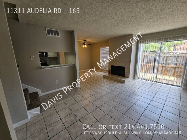 Building Photo - 2 story condo, cov parking, patio, full wa...