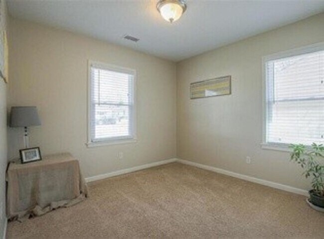 Building Photo - {5611} Updated OP Ranch + Two Car Garage + Fenced Yard and Stamped Concrete Patio Perfect for Spr...