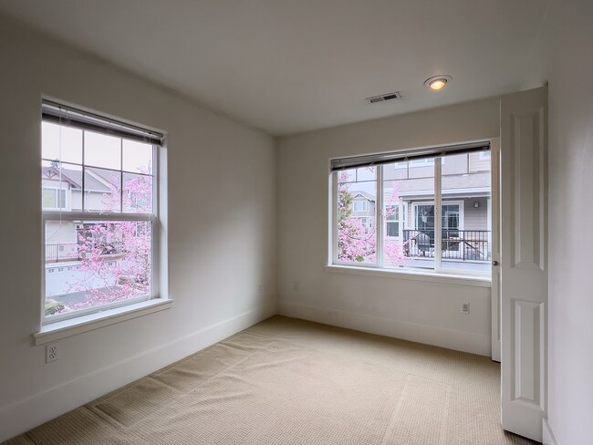 Building Photo - Enjoy this 3 Bedroom 2.5 Bathroom End Townhome ~ 2 Car Garage + Washer & Dryer! Great Cedar Mill ...