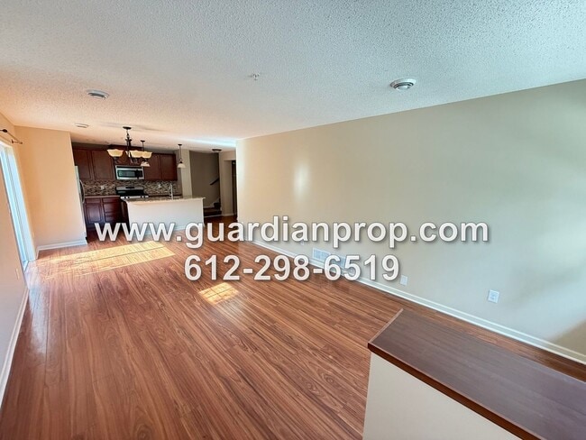 Building Photo - End Unit Townhouse Available Now, Loft Area, Large Primary Suite, Private Side Patio