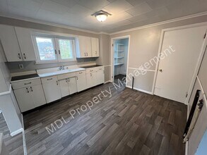 Building Photo - Spacious 5-Bedroom Home- This won't last long- Call NOW 989-895-1590