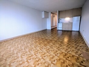 Building Photo - Spacious partly furnished Studio with electric/water utilities and no parking at Pacific Grand