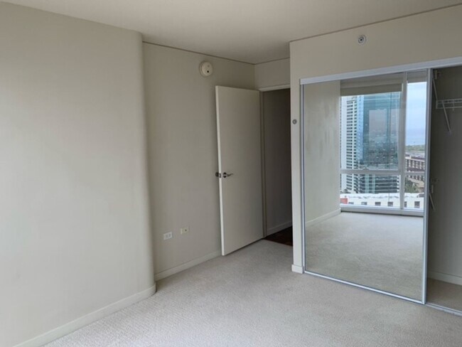 Building Photo - Moana Pacific - 2 bedroom plus den, 2 bath Condo with 2 parking - avail now!