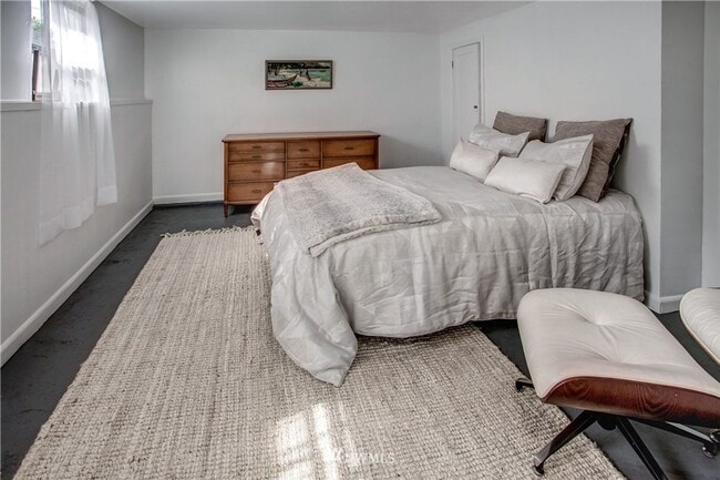 Building Photo - Timeless Charm Meets Thoughtful Updates in This Light-Filled Retreat