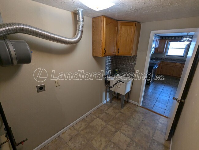 Building Photo - Beautifully Maintained Brick Duplex