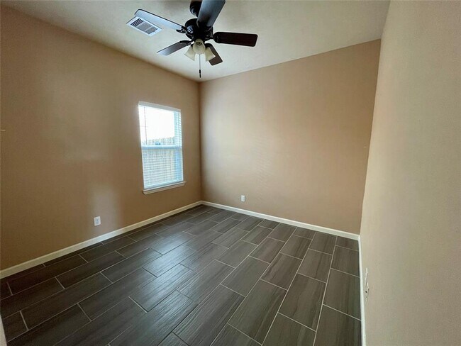 Building Photo - 10803 Woodwind Shadows Dr