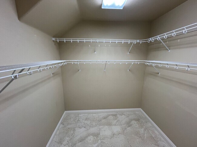 Building Photo - A Fantastic 4 Bedroom Home with the primary Downstairs, in Silverado Ranch