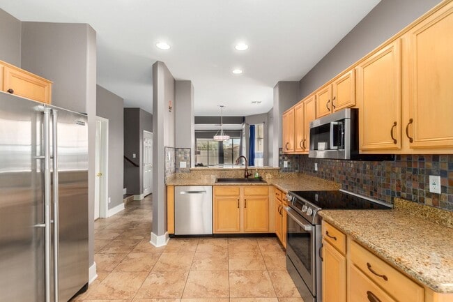 Building Photo - PRICE REDUCED & Move-In Ready!