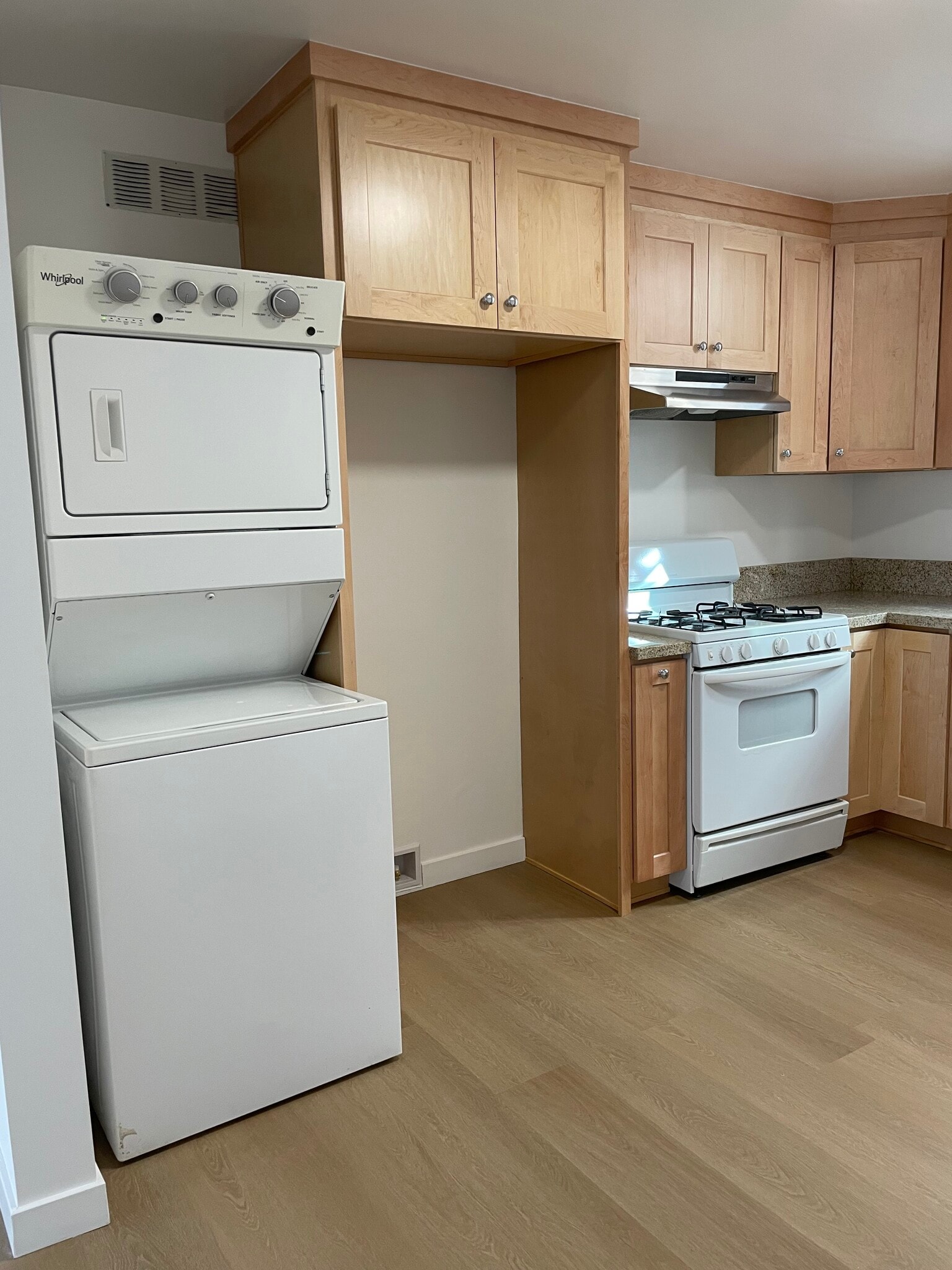 Kitchen with stacked washer and dryer - 2215 Mathews Ave