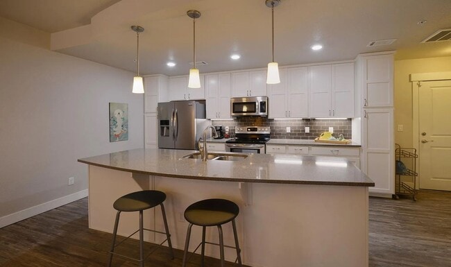 Building Photo - Urban Living at The Flats at Rigden Farm –...