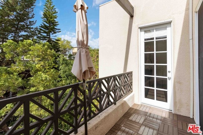 Building Photo - 1875 S Beverly Glen Blvd