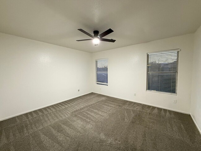 Building Photo - $500 OFF 1ST MONTHS RENT Updated 3-Bedroom Townhome in Gated Community with Pool Access
