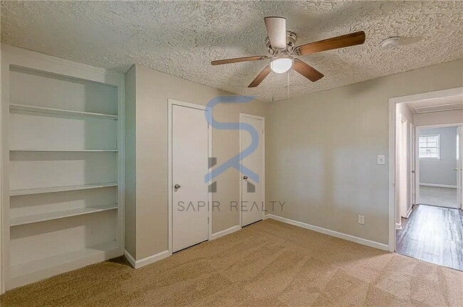 Building Photo - LIMITED-TIME OFFER!  Apply today with NO APPLICATION FEE! Terms apply. Call (678) 487-7896, Optio...