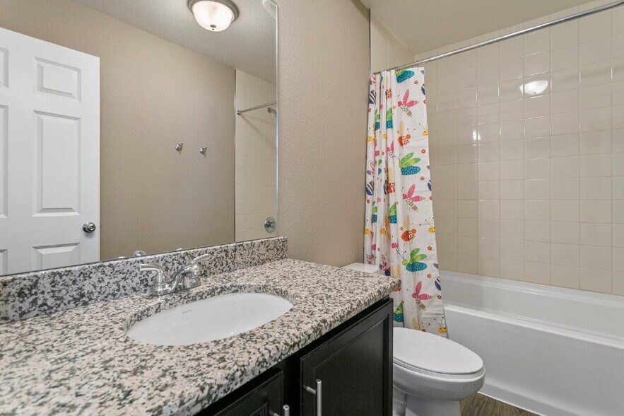 Building Photo - Spacious Banning Lewis Home with Finished ...