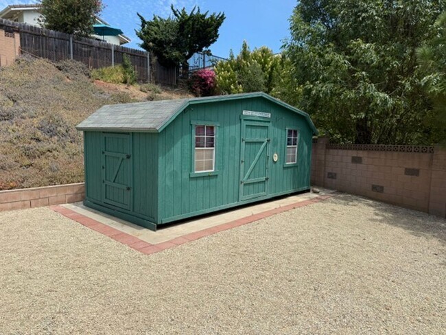 Building Photo - 4 bed, 2 1/2 bath home with RV access