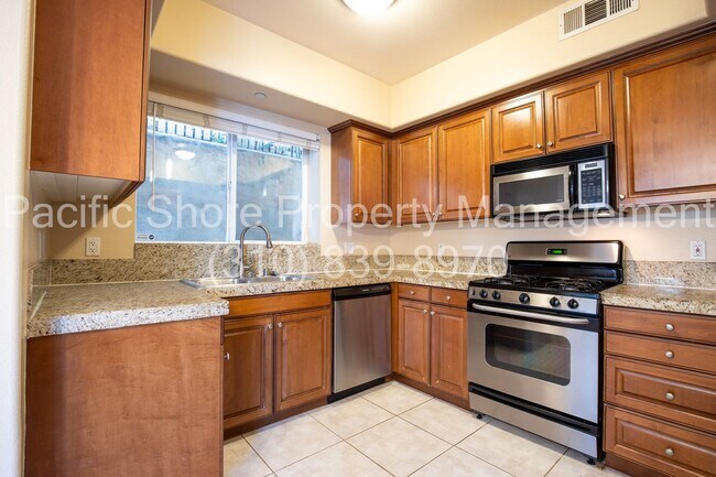 Building Photo - Elegant Westside Condo with Modern Upgrades and Private Patios