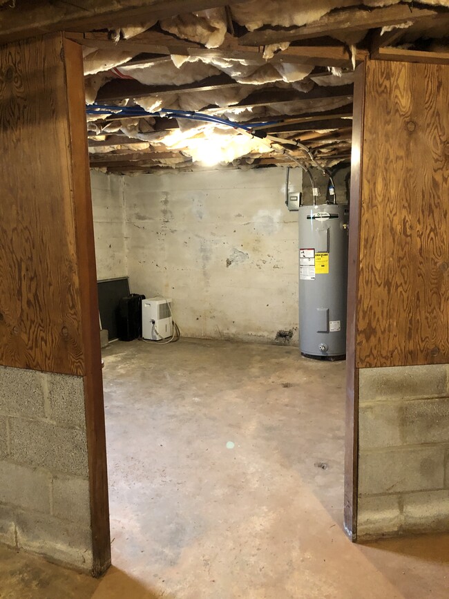 Basement storage area and new hot water heater - 2205 Mayflower Dr