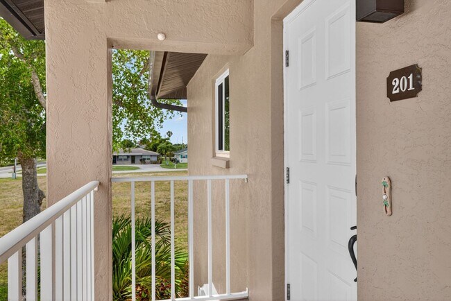 Building Photo - Gulf Access 2 bedroom 2 Bath Fully updated Condo with Water View