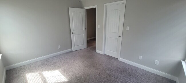 Building Photo - Spacious Elegance Awaits: 4-Bedroom Gem with Granite Countertops on Harrington Road!