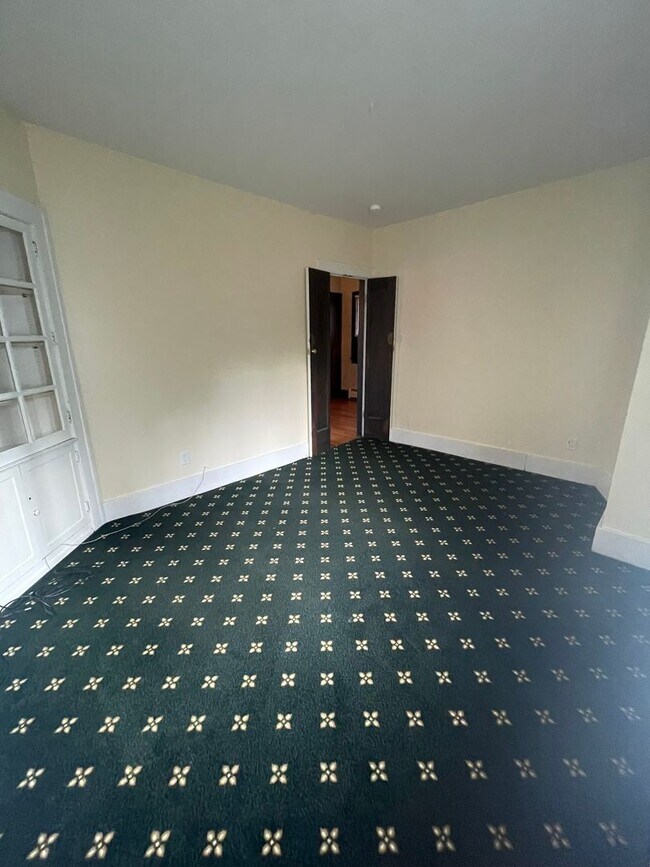 Building Photo - One Block to the Diag! Charming Home with Private Courtyard + Parking