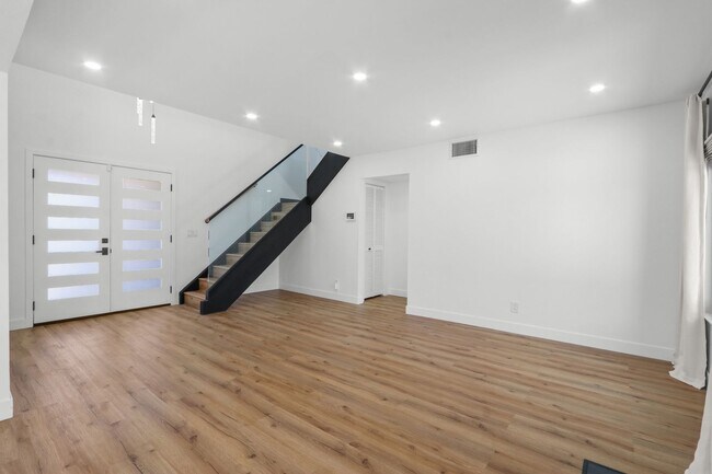 Building Photo - Renovated Lake Forest Home with Expansive Yard & Modern Finishes
