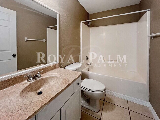 Building Photo - Make Yourself at Home — Charming 3-Bed, 2-Bath in Lehigh Acres. Your Duplex Dream Just Got Better!