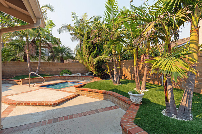 Landscaped backyard has patio and spa - 3481 Aquarius Dr