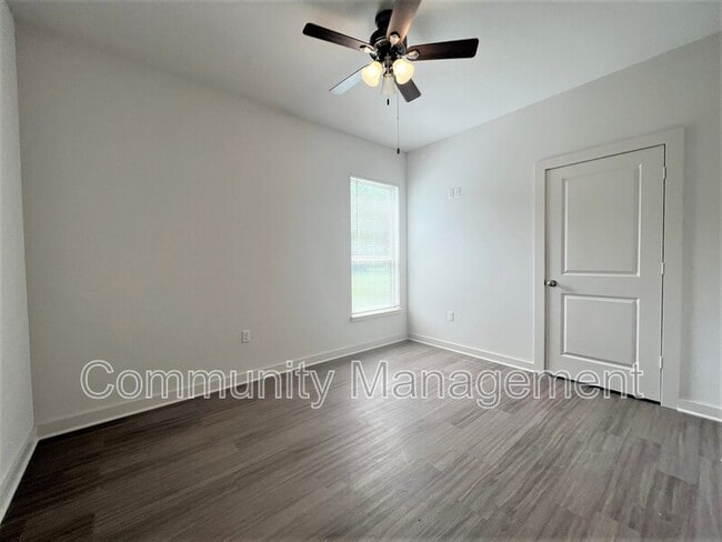 Building Photo - 7677 River Ridge Dr