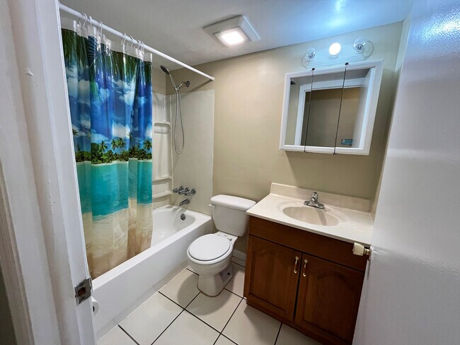 Bathroom with shower and tub. - 419 Ocean Ave