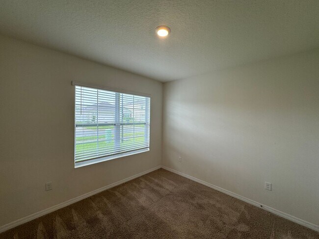 Building Photo - 3BD/2BA Modern Florida Home Living Reimagined — Solar-Powered Elegance Near I-95 in Edgewater! FU...