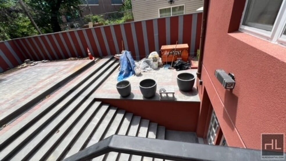 Building Photo - 100% GUT RENOVATED DUPLEX  with PRIVATE GA...