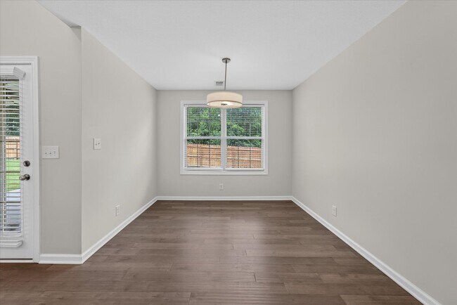 Building Photo - Like New Three Bedroom with Bonus!