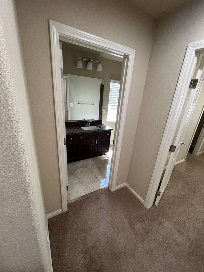 Building Photo - A Fantastic 4 Bedroom Home with the primary Downstairs, in Silverado Ranch