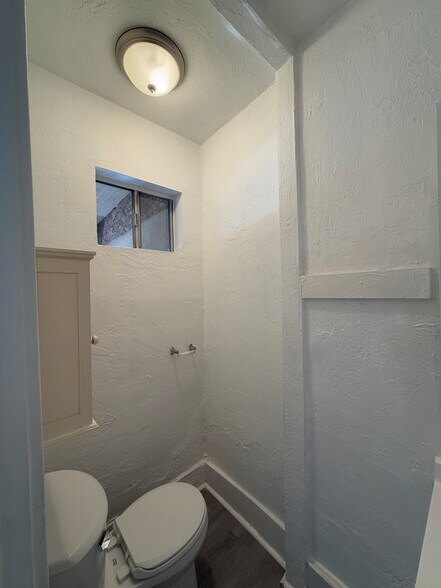 Primary Half Bathroom new toilet - 1929 Daly St