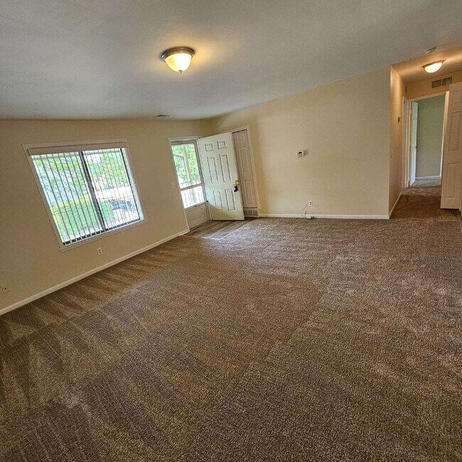 Building Photo - Upper 2 Bedroom Unit with New Carpet and F...