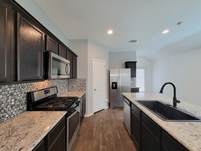 Building Photo - Welcome to your next home in the heart of Downtown Cleveland, Texas! This inviting 3-bedroom, 2-b...