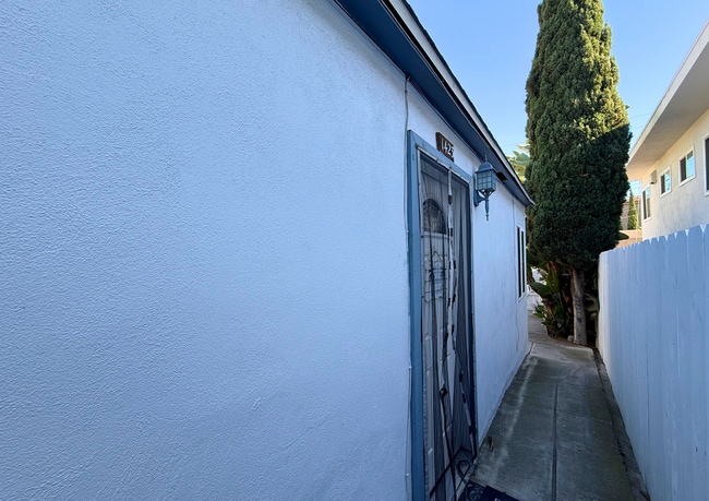 Building Photo - Cozy 2BR with Serene Courtyard Escape