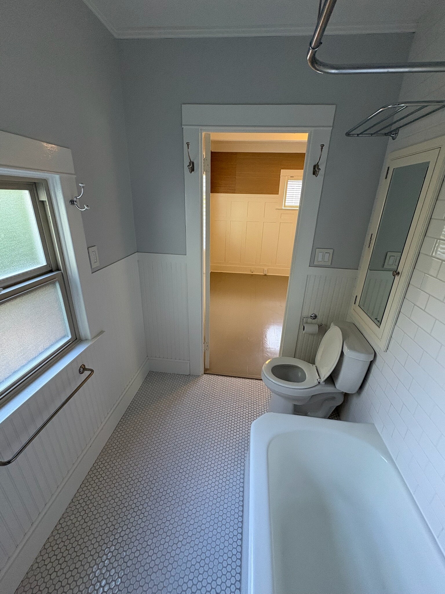 Downstairs bathroom with pocket door - 308 14th St