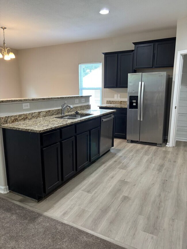 Building Photo - Newly Renovated Four Bedroom Home In North...