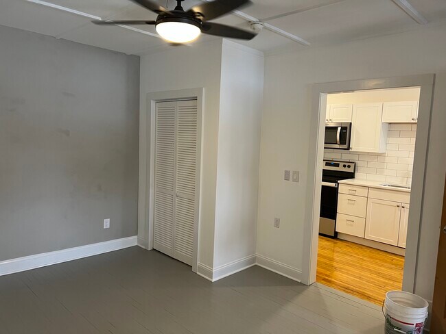 Large bedroom with access to rear deck. - 58 Albany St