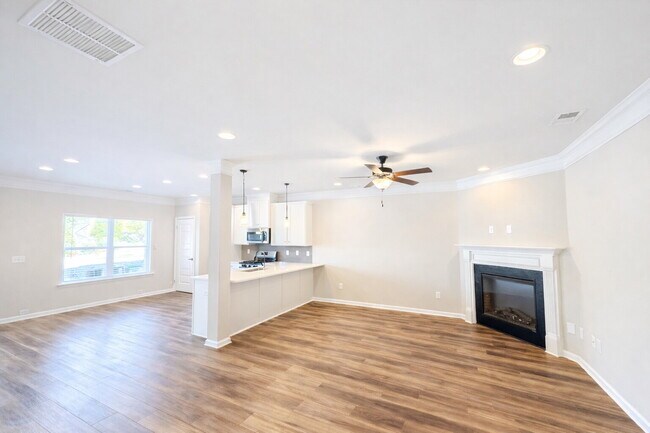 Building Photo - 3-bedroom Townhome in Buford City Schools with Quartz Kitchen, Private Suite, and Walkable Downto...