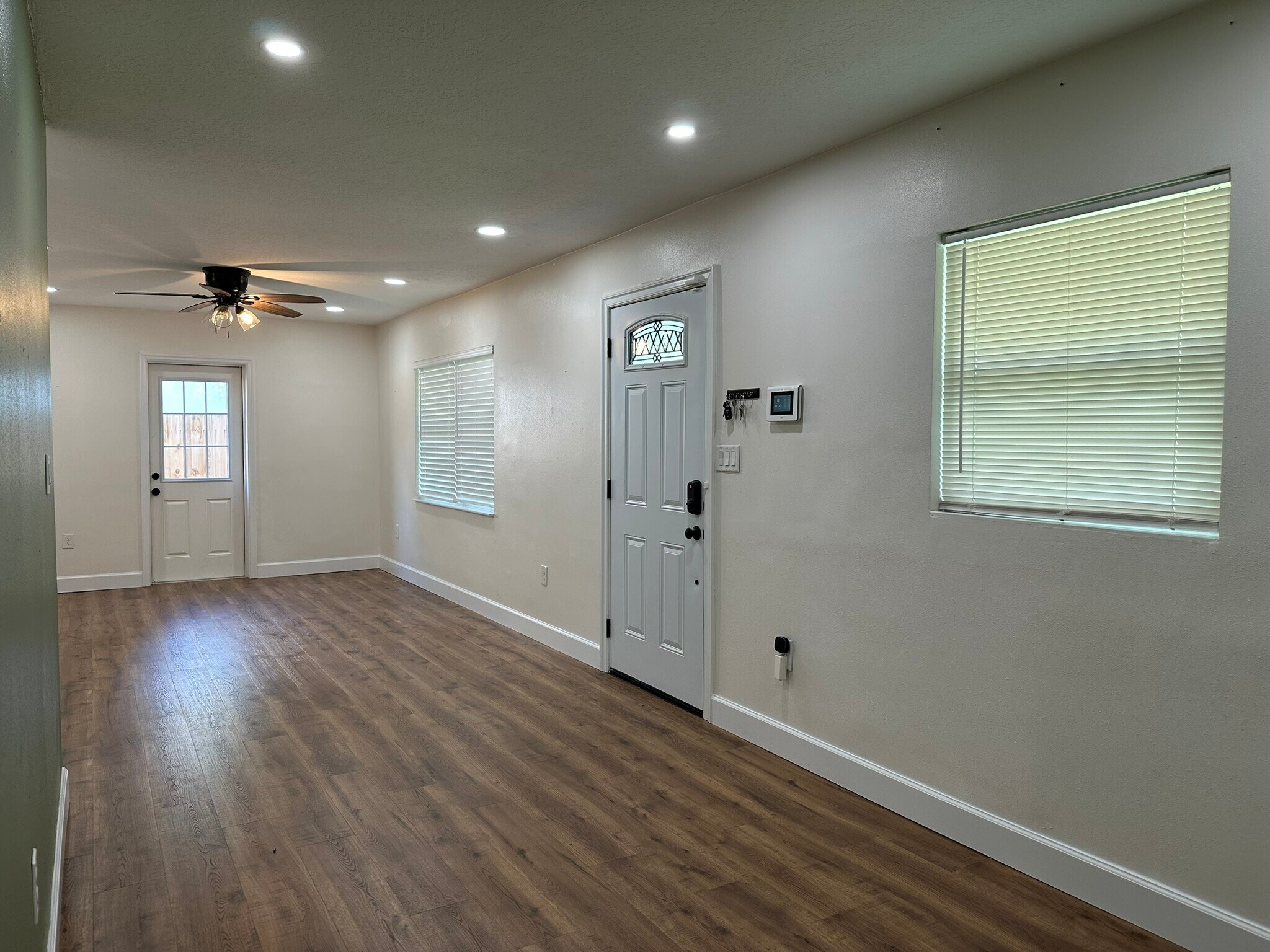 view from dining room towards living room - 5932 McKee Lake Dr N
