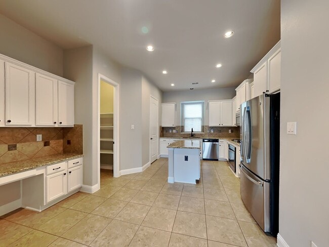 Building Photo - An elegant retreat designed for comfort, entertaining, and year-round enjoyment.