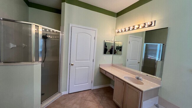 Building Photo - Spacious 4/3.5 Pool Home with Water View & 3-Car Garage in Lee Vista Area (close to Lake Nona)