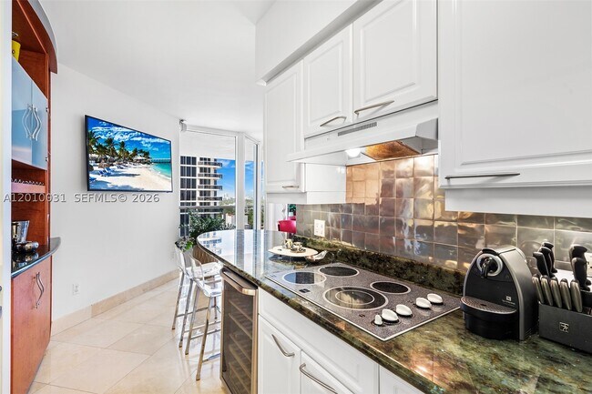 Building Photo - 4779 Collins Ave