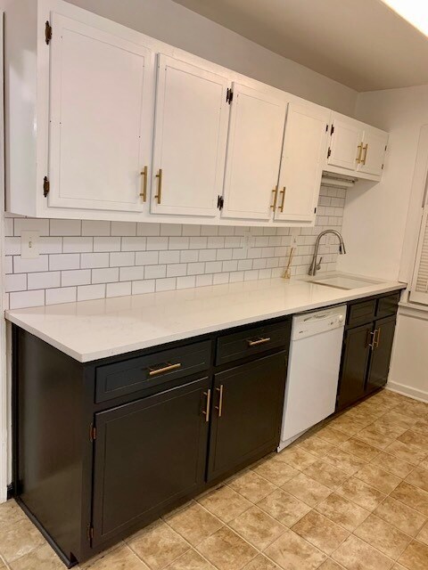 Updated kitchen with quartz countertops and touch faucet - 1206 Church St